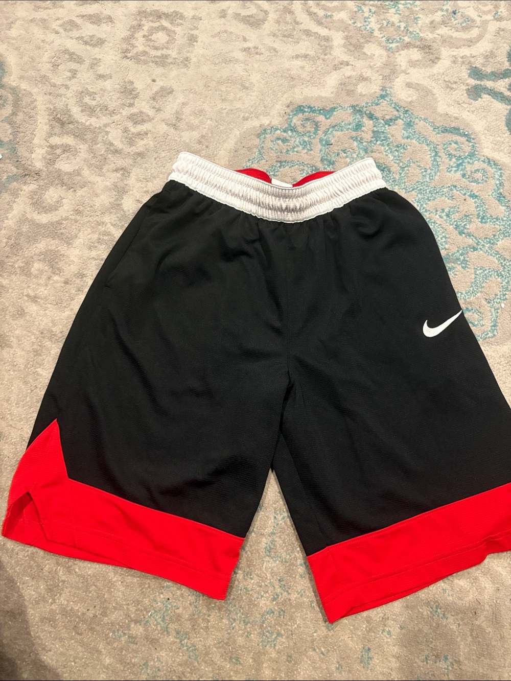 Nike Black Athletic Shorts with Red Hem and White Waistband